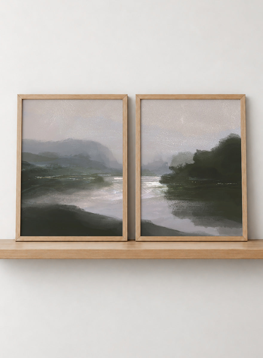 Shop Tranquillitas by Dan Hobday, a set of 2 landscape wall art prints posters featuring misty water, tree-lined banks, distant hills, and deep grey green tones.