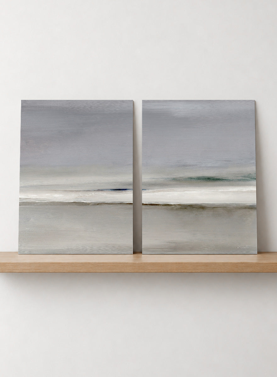 Shop Horizon by Dan Hobday, a set of 2 minimalist landscape wall art prints posters featuring soft gray seascapes, open water, and a quiet horizon.
