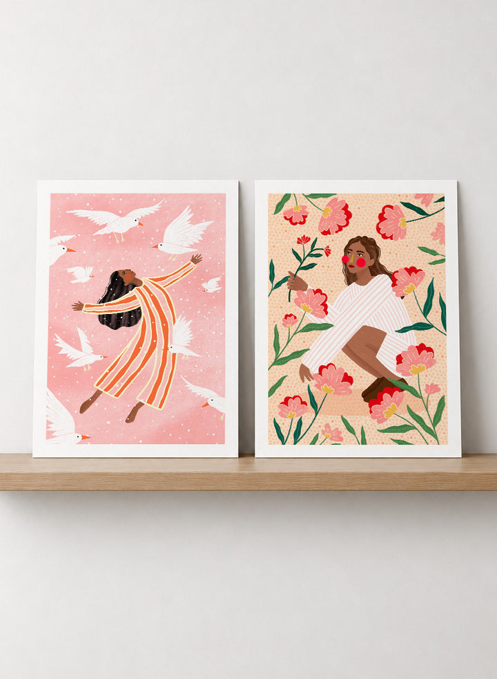Shop In Her Happy Place by Bea Müller, a set of 2 figurative wall art prints posters featuring women surrounded by birds and flowers in soft pink tones.
