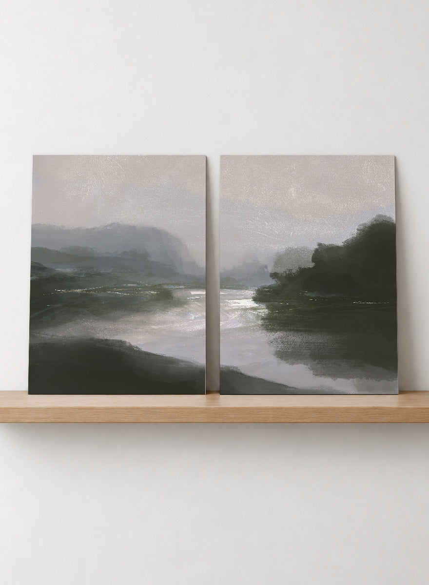 Shop Tranquillitas by Dan Hobday, a set of 2 landscape wall art prints posters featuring misty water, tree-lined banks, distant hills, and deep grey green tones.