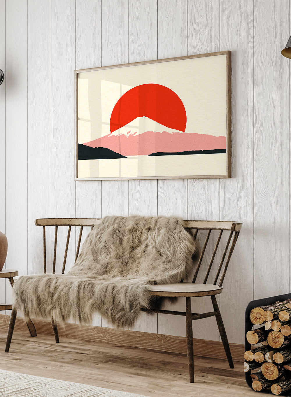 Framed artwork of a mountain with a red sun on a beige background. Fuji Sun by Rosi Feist is a modern Japanese landscape art print featuring Mount Fuji, a bold red sun, and minimalist contemporary poster design.