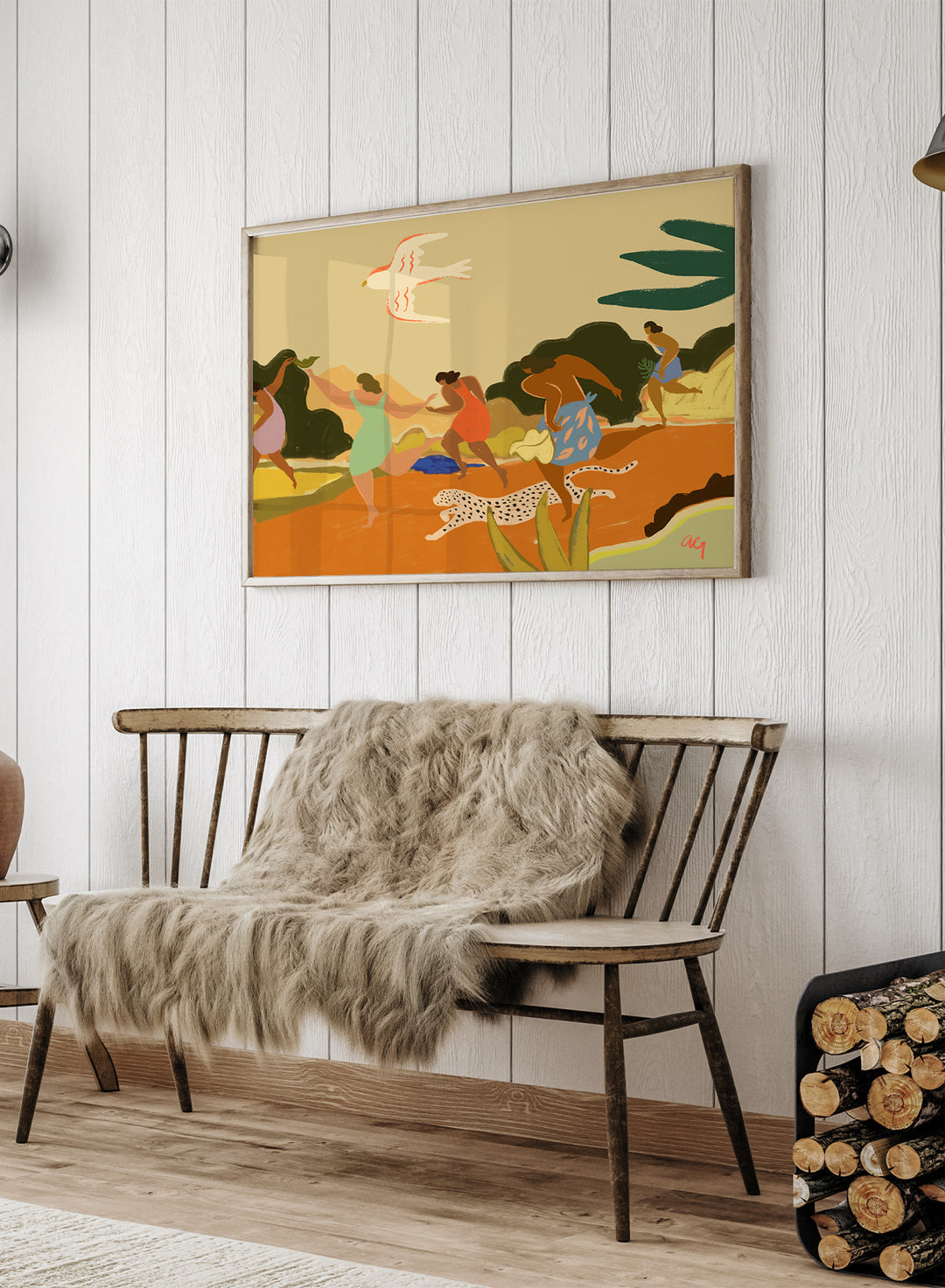 A framed art print featuring a stylized illustration of figures dancing and playing outdoors, with a bird, palm leaves, and a spotted cat. Run by Arty Guava premium framed fine art print featuring women racing through a tropical landscape beside a spotted leopard in warm, playful colors.