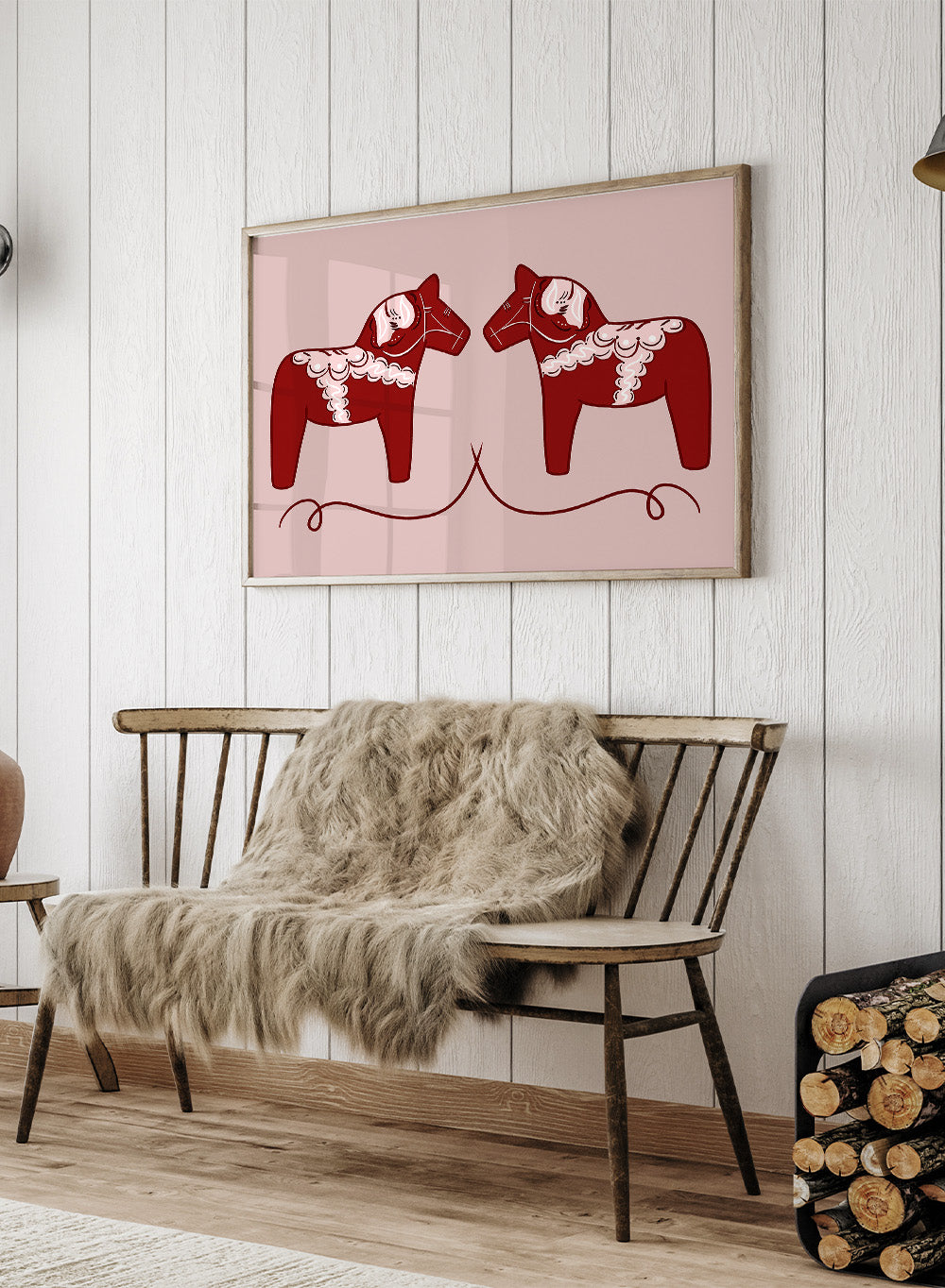 Two red Dala horse figures with white patterns on a pink background. Nordic Horses Twins by Athene Fritsch is a Scandinavian folk art illustration art print featuring Swedish Dala horses, bold red color, and modern wall art design.