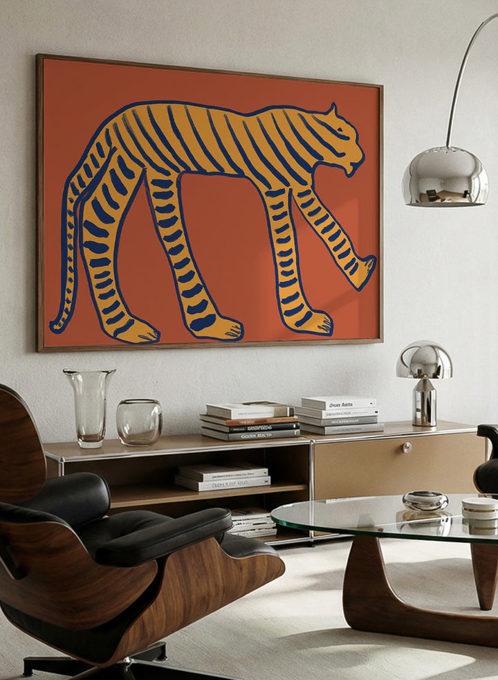 Bold Tiger Stride by The Art Concept animal art print featuring an ochre tiger with deep blue stripes on a warm rust background.