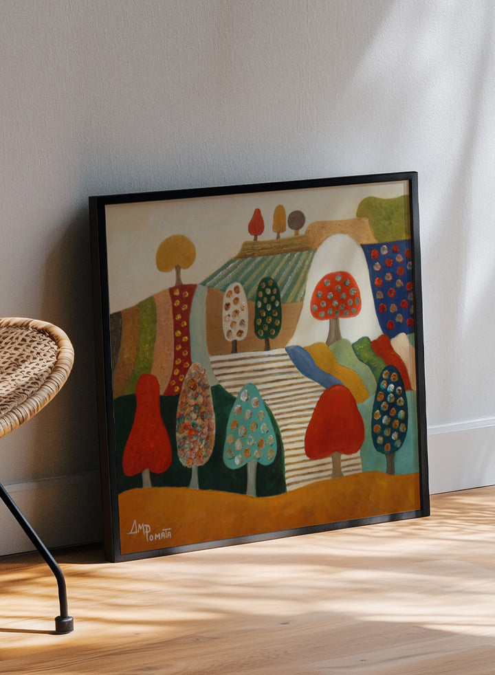 A framed abstract landscape painting featuring stylized trees, hills, and geometric shapes in red, blue, green, yellow, beige, and brown tones. Shop Whimsical Tree Landscape by Angeles M. Pomata, a colorful landscape art print featuring patterned trees, patchwork hills, and warm autumn tones.