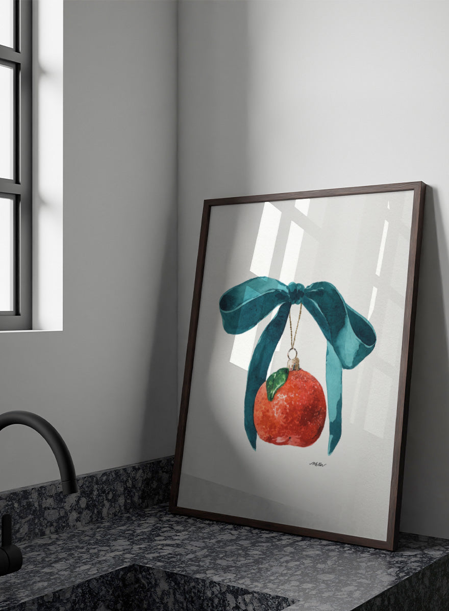 Shop Festive Tangerine Ornament by NKTN, a playful Christmas wall art print poster featuring a bright tangerine, oversized teal bow, and watercolor holiday style.