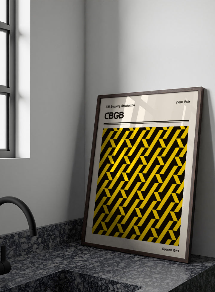A vintage-style poster or print featuring a bold black and yellow geometric pattern in the center, with the text &