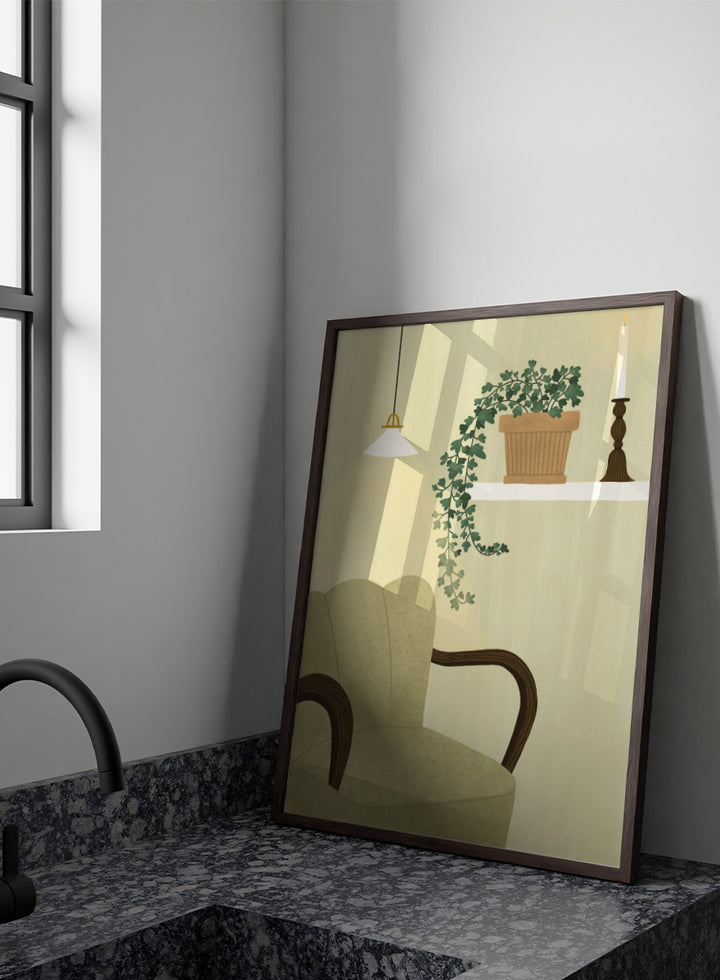 A framed art print featuring a cozy interior scene with a beige armchair, a hanging pendant light, a shelf with a potted trailing green plant and a candlestick, and a cream-colored wall background. Shop Cozy Indoor Retreat by Elsa Nätterdal, a modern interior art print featuring a cozy armchair, trailing houseplant, candlelight, and warm neutral tones.