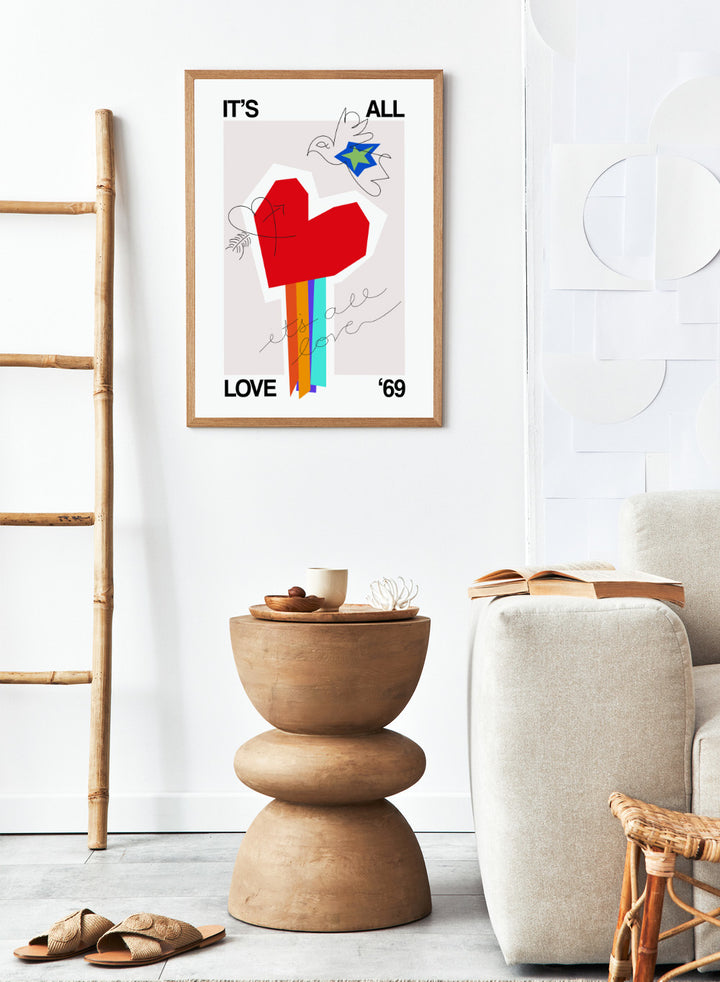 Colorful abstract design with a red heart and text on a light background. It’s All Love ’69 Heart Greige by Frances Collett is a colorful heart art print with rainbow stripes and expressive linework. Officially licensed contemporary wall poster with optional framing.
