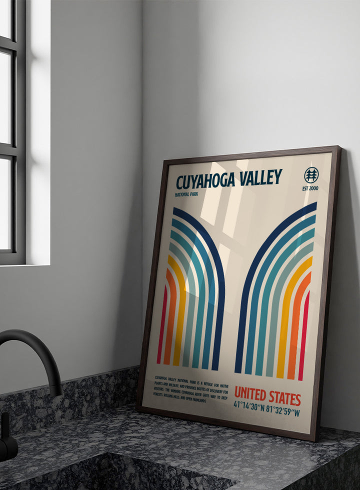 A retro-style poster for Cuyahoga Valley National Park featuring symmetrical rainbow arches in blue, teal, green, yellow, orange, and red on a cream background, with text reading &