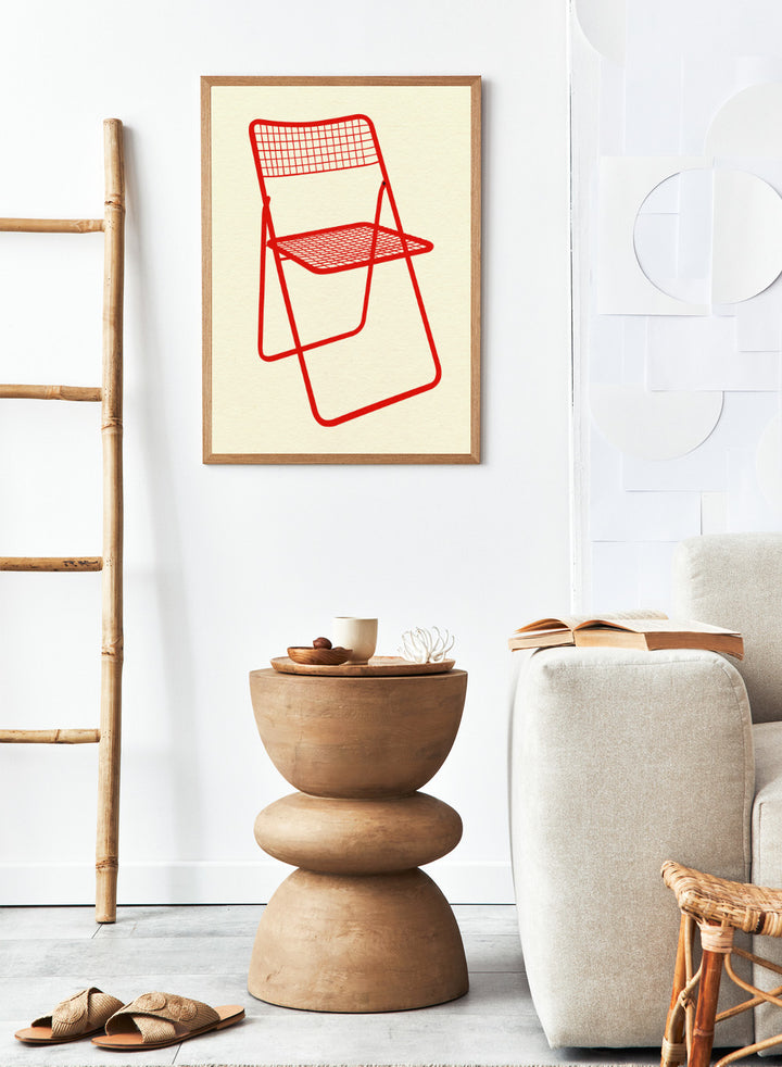 Red metal chair on a beige background. Modern chair wall art print by Rosi Feist featuring a bold red wire net chair illustration. Contemporary minimalist poster for design lovers.