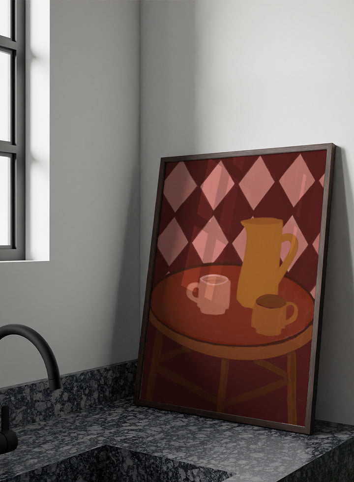 A stylized illustration of a round wooden table with a pink mug, a yellow pitcher, and a small cup against a dark red and pink diamond-patterned background. Retro Coffee Time by The Art Concept warm art print featuring mugs, a pitcher, and a café table in soft retro tones and a diamond pattern background.