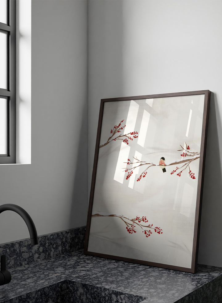 Shop Winter Bird With Berries by Nikita Jariwala, a winter bird wall art poster print featuring snowy branches, red berries, soft neutrals, and delicate seasonal detail.