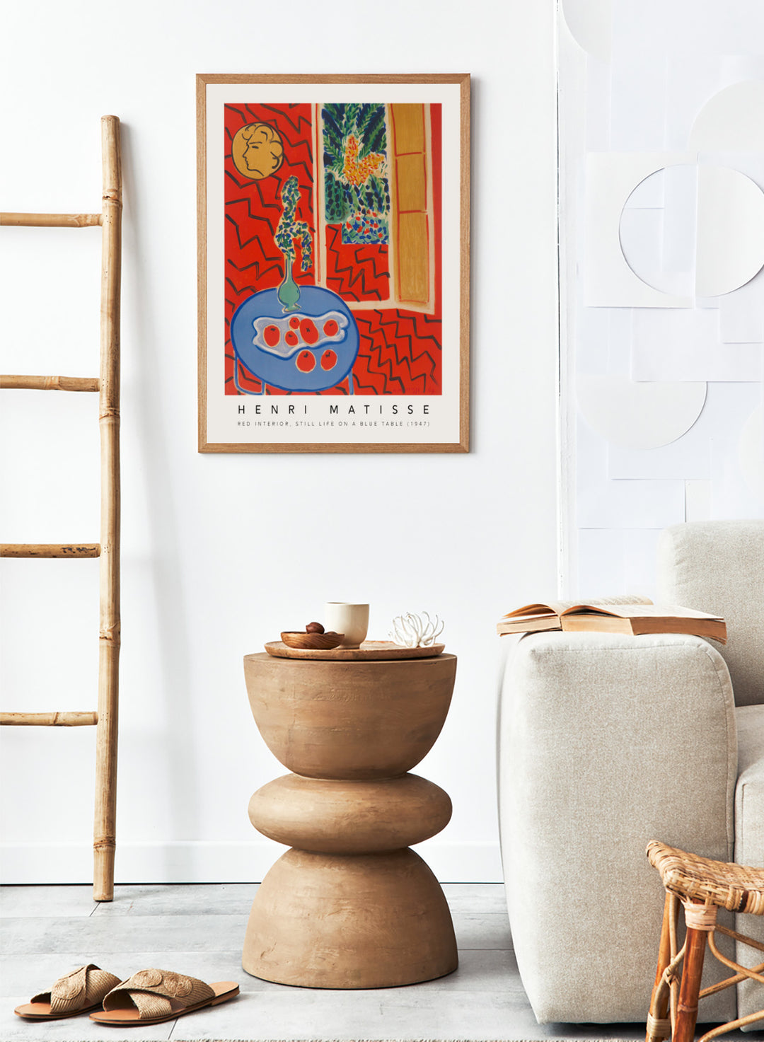 Artistic depiction of a still life scene with a blue table, vase, and fruit, by Henri Matisse. Red Interior, Still Life on a Blue Table by Henri Matisse is a 1947 modern art print featuring bold color, expressive interiors, floral still life details, and iconic French design.