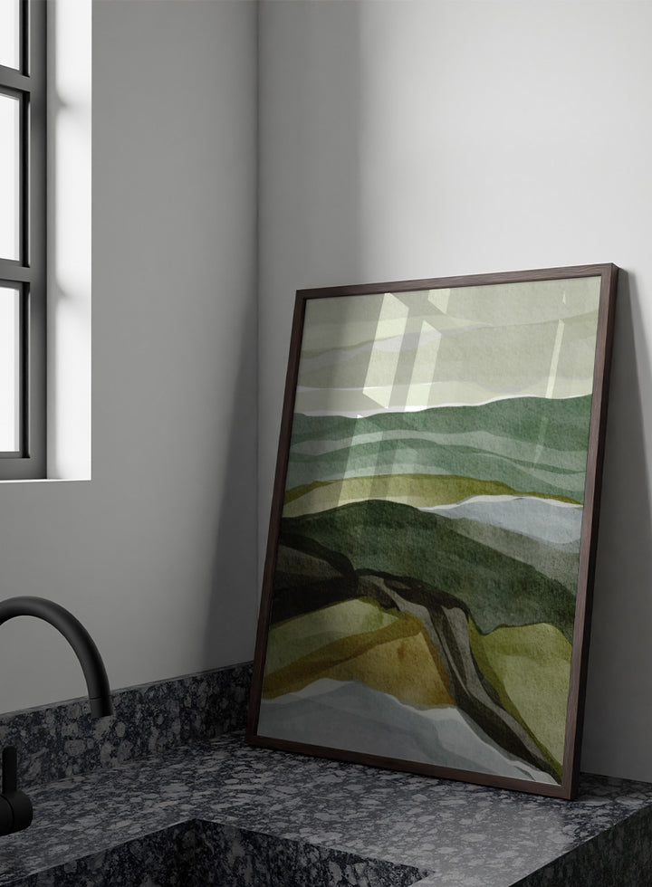 Shop Serene Green Landscape by Nikita Jariwala, a modern abstract landscape art print featuring layered hills, rolling countryside, and soft green, olive, gray, and blue tones.