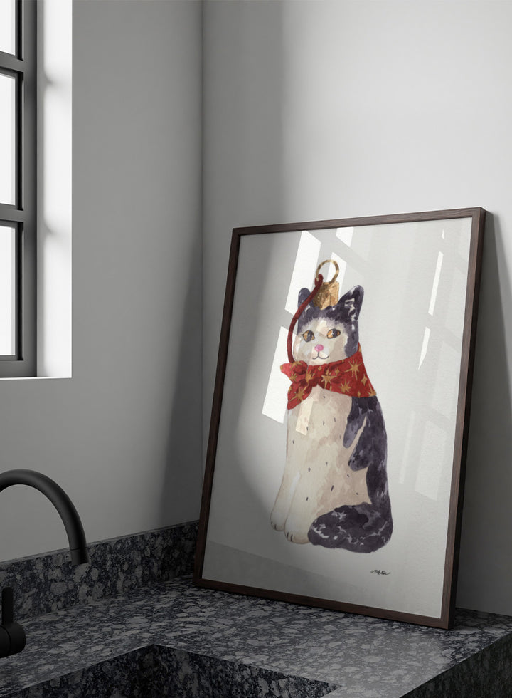 Shop Christmas Cat Ornament by NKTN, a festive cat animal wall art print poster featuring a black-and-white cat in a red star scarf with watercolor detail.