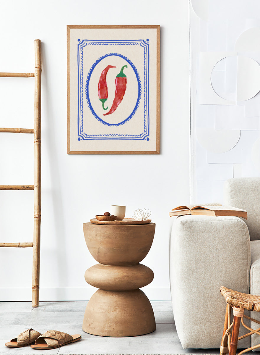 Spicy Chili Peppers by Katarzyna Gąsiorowska kitchen art print featuring red chilies in an ornate cobalt frame with vintage Mediterranean style.