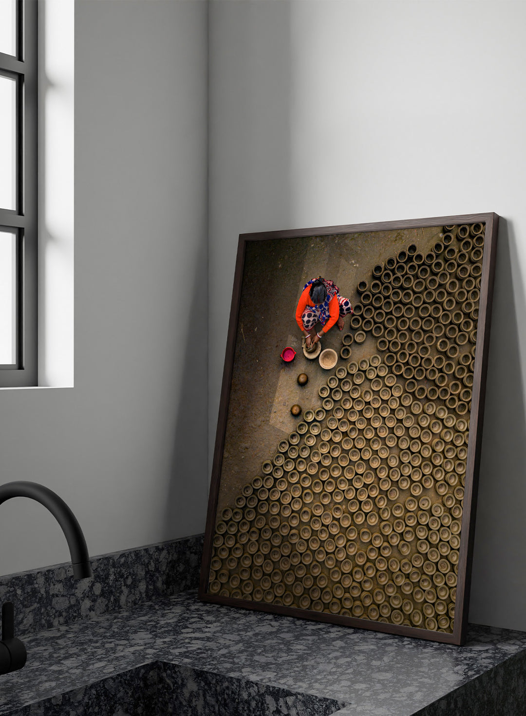 Person working with clay pots on a textured surface. Pot Making by Azim Khan Ronnie aerial photography print showing clay pots drying in Bangladesh village, traditional craft wall art poster