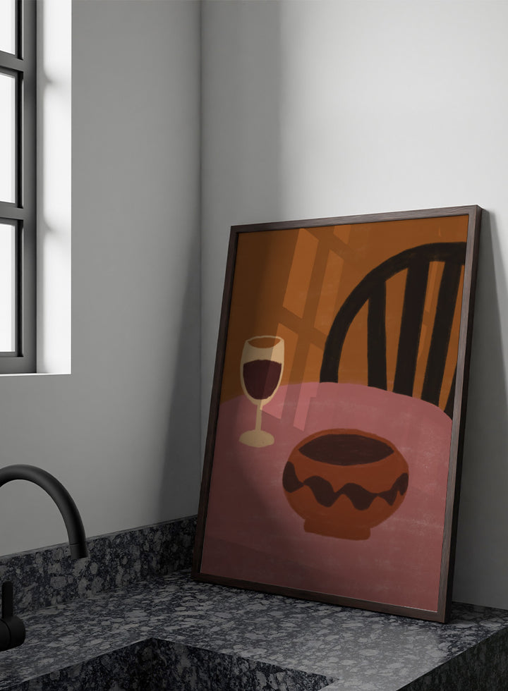 A stylized still life artwork showing a pink table, a dark brown bowl in the foreground, a wine glass with deep red liquid, and a black chair against a warm brown background. Warm Dining Still Life by The Art Concept still life art print featuring red wine, a rounded bowl, pink tabletop, and rich burgundy and rust tones.