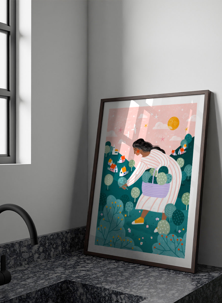 Shop Idyllic Village Gathering by Bea Müller, a figurative wall art print poster featuring a woman in a whimsical village landscape beneath a pink sky.