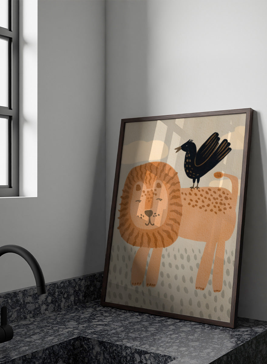 A stylized illustration of a lion and a crow on a cream background with clouds and dotted ground. The lion is tan and peach with brown stripes in its mane, and the crow is black with small gold spots. Shop Friendly Lion And Bird by Nikita Jariwala, a nursery wall art print poster with a lion, bird, animal illustration, and beige tones.