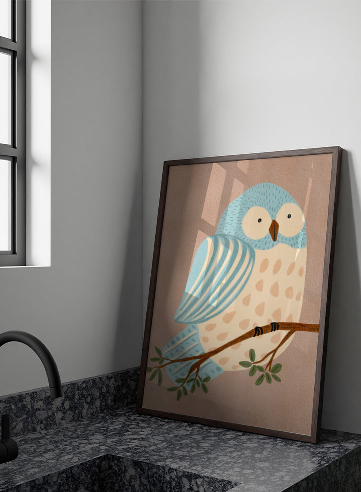A stylized illustration of a blue and cream owl perched on a brown branch with green leaves, set against a warm beige background. Shop Whimsical Blue Owl by Nikita Jariwala, a blue owl wall art print poster for nursery and kids room decor featuring a playful bird illustration and soft blue tones.