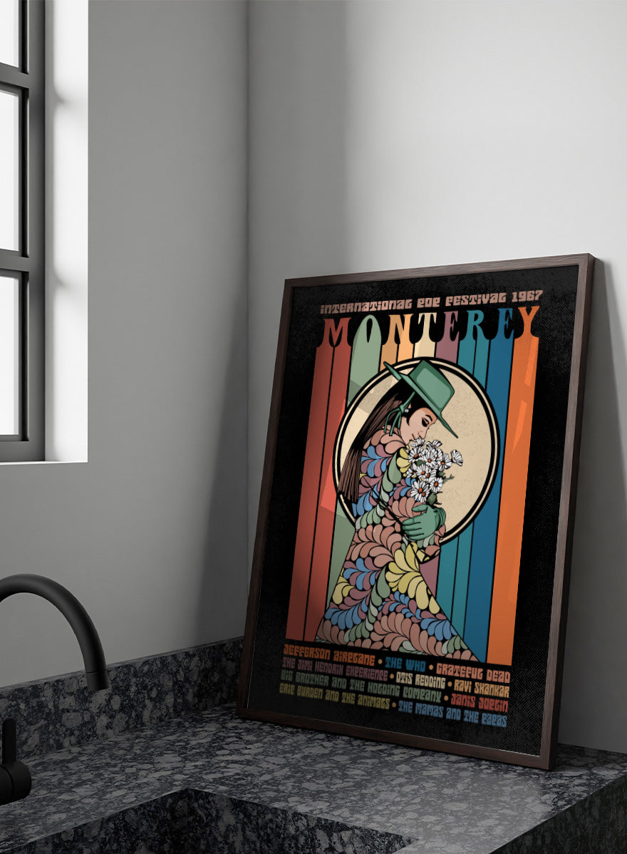 A retro-style concert poster for the 1967 European Tour featuring the band Monterey. The design has a black background with vertical multicolored stripes in orange, green, blue, and beige, surrounding an illustration of a woman in a green hat and patterned dress holding white flowers. Flower Child Festival by Retrodrome retro music art print inspired by the 1967 Monterey Pop Festival, with flower-child imagery and vintage concert poster style.