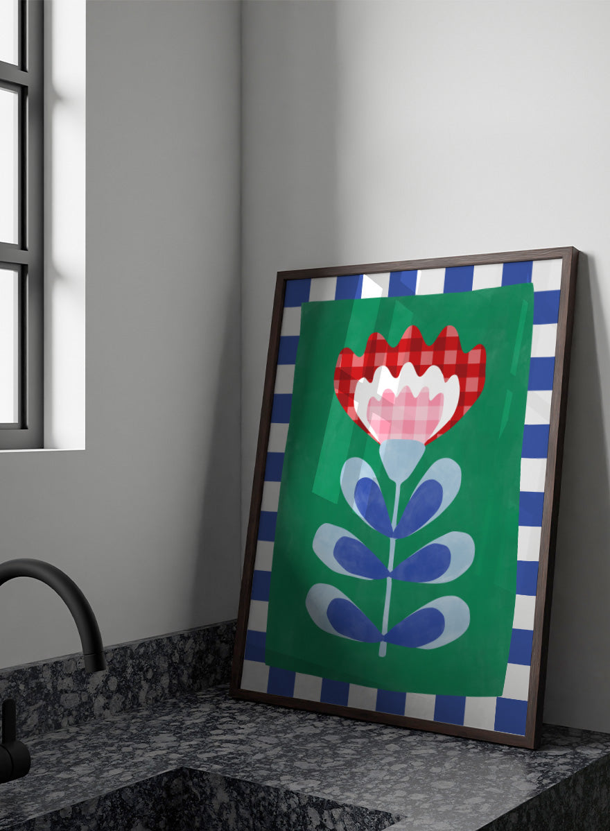 Shop Gingham Folk Flower by Elena Ristova, a colorful floral wall art print poster featuring gingham petals, checkerboard borders, and bold green, red, blue, and pink.