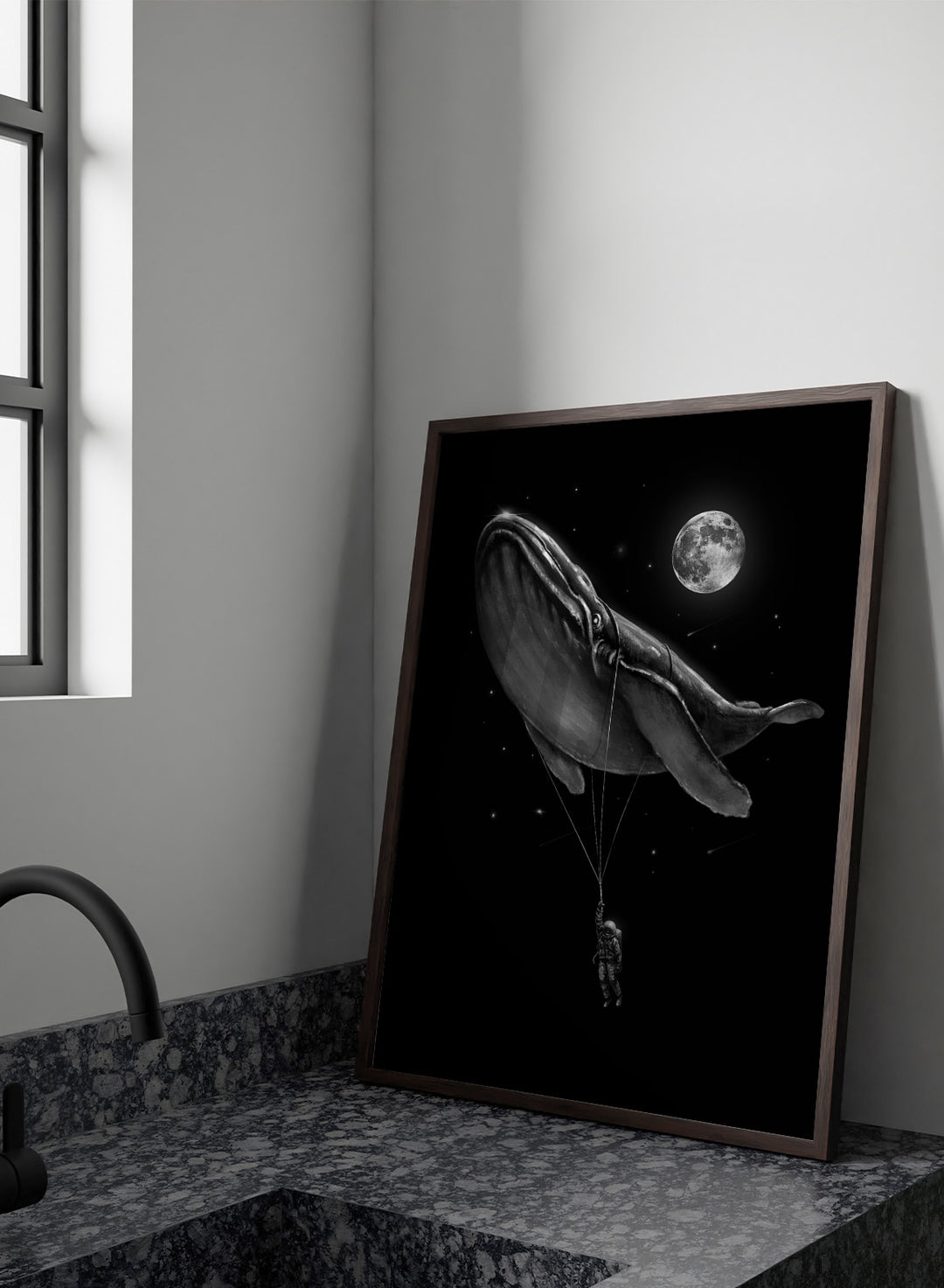 Black and white illustration of a large whale balloon with a person attached, set against a starry night sky with a moon. Cosmic Whale Ride by Nicebleed is a surreal space art print featuring an astronaut hanging from a floating whale, modern aesthetic wall poster.
