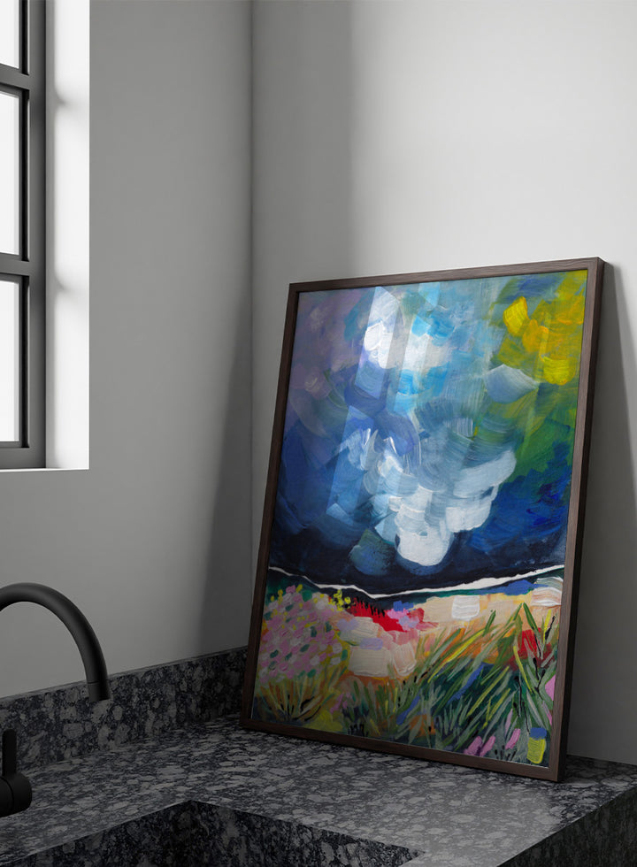 An expressive landscape painting featuring a dark blue stormy sky with swirling brushstrokes and a foreground of green grasses, pink flowers, and yellow-green foliage. Shop Vibrant Abstract Field Sky by Dirkie Nell, a colorful abstract landscape art print featuring wildflowers, open fields, and a dramatic blue sky.