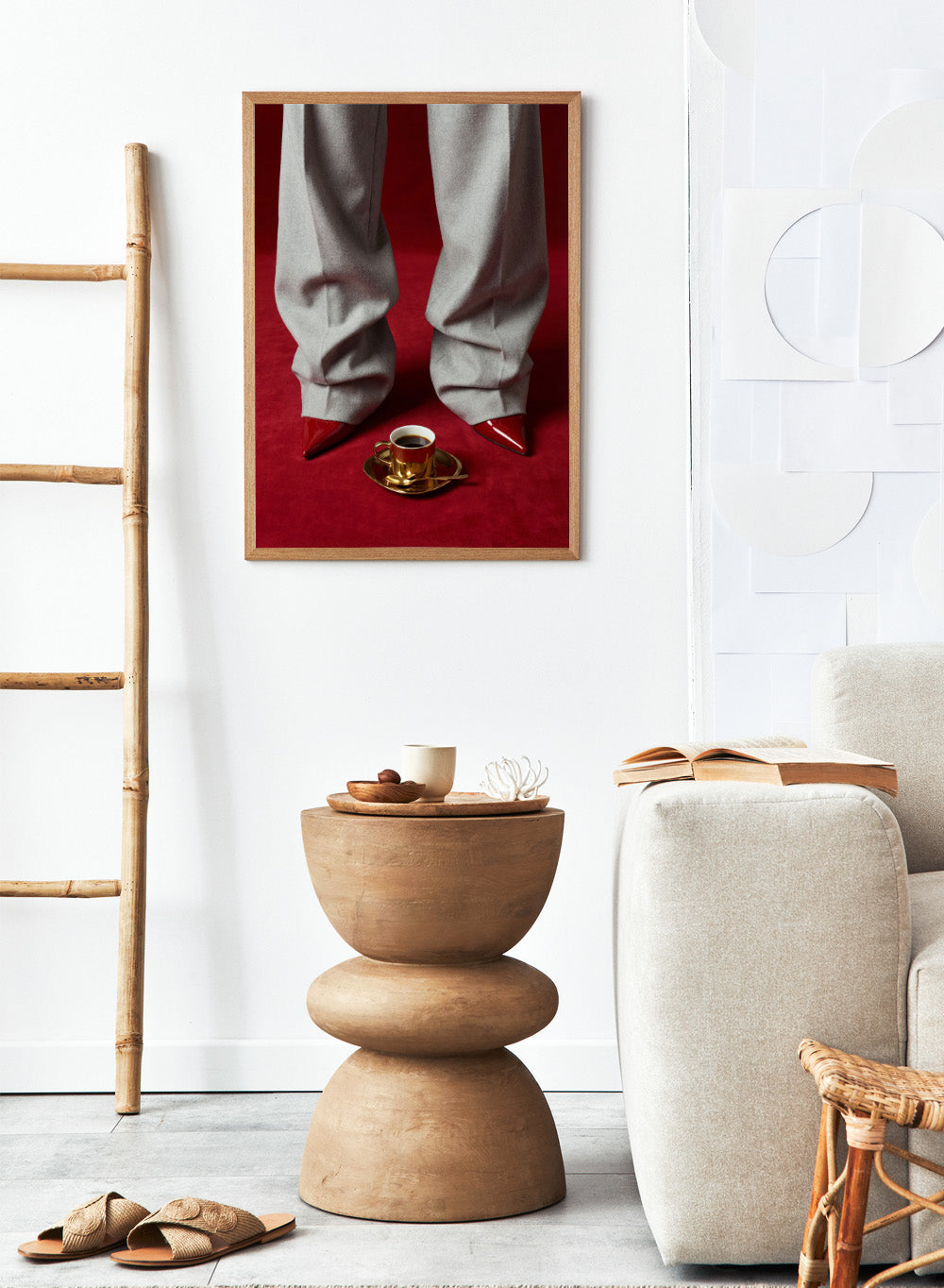 White pants with red shoes on a red carpet, featuring a gold cup and saucer with coffee. Red Shoes and Coffee by Andreas Magnusson is a fashion photography art print featuring red heels and espresso. Officially licensed modern wall poster.