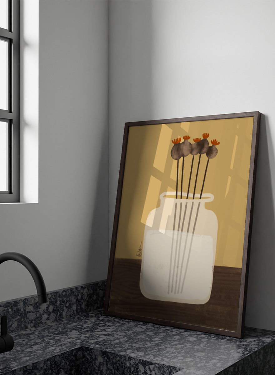 A stylized art print depicting a white glass jar filled with water, holding four dried poppy pods with orange tops, set against a warm tan background and a dark brown wooden surface. Shop Dried Poppy Pods Vase by Elsa Nätterdal, a botanical still life art print featuring dried poppy pods, a cream vase, and warm autumn tones.