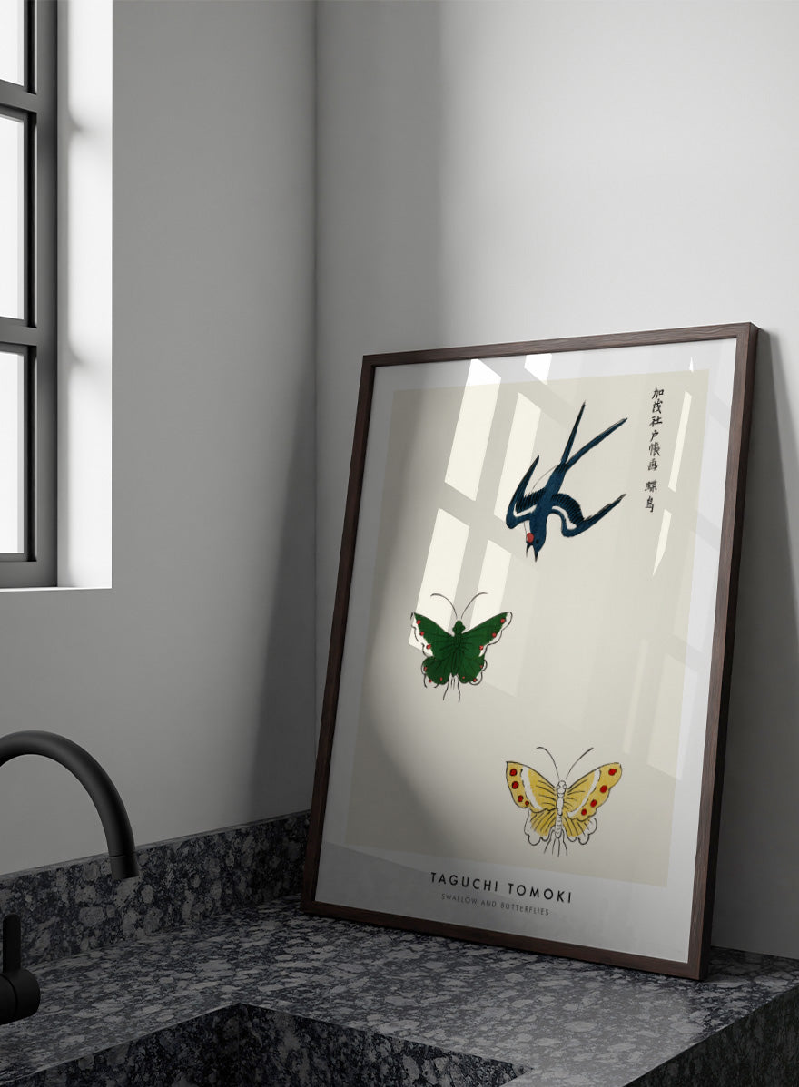 Swallow and Butterflies by Taguchi Tomoki from Yatsuo no Tsubaki is a vintage Japanese woodblock art print featuring a blue swallow and colorful butterflies on warm ivory.
