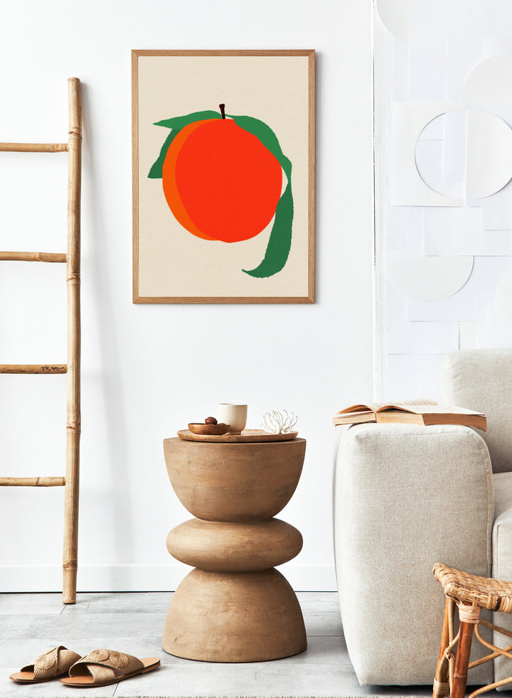 Illustration of a peach with green leaves on a beige background. Peach by Rosi Feist is a modern minimalist fruit art print with bold color and Bauhaus-inspired graphic design. Officially licensed fine art poster with framing.