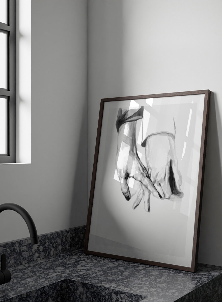 Shop Gentle Hands Connected by Sophia Novosel, a minimalist black and white wall art print poster featuring two hands touching in a soft, intimate gesture.