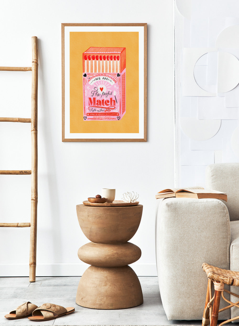 Illustration of a matchbox with 'We are the perfect match' text on a yellow background. Match Box, The Perfect Match by Baroo Bloom is a playful love-themed art print featuring a pink illustrated matchbox. Officially licensed wall poster with optional framing.