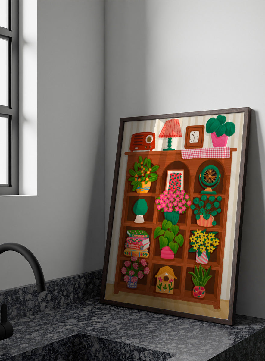 A colorful cartoon-style illustration of a wooden bookshelf filled with potted plants, flowers, books, a lamp, a clock, a radio, and other home decor items, set against a striped wall. Shop Cozy Botanical Shelf by Nidhi Kachhadiya, a colorful botanical wall art print featuring houseplants, flowers, vintage decor, and warm green and pink tones.