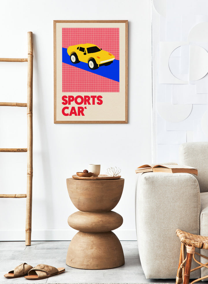 Yellow sports car on a red and blue geometric background with 'SPORTS CAR' text. Sports Car by Rosi Feist is a bold minimalist car art print featuring a bright yellow sports car and graphic typography. Officially licensed Bauhaus-inspired fine art poster with framing.