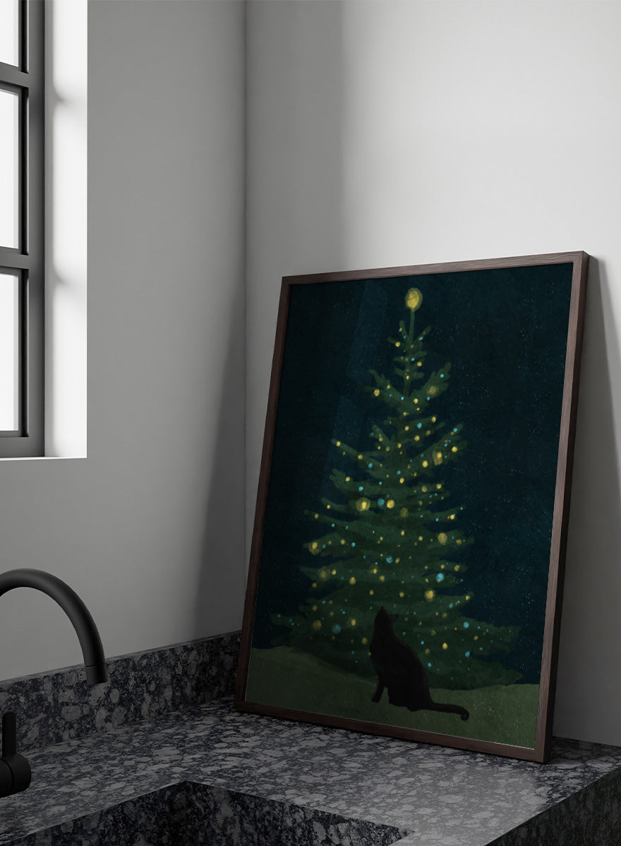 Shop Christmas Wishes by Katie O’Shea, a charming black cat Christmas wall art print poster featuring a glowing tree, festive lights, and deep green tones.