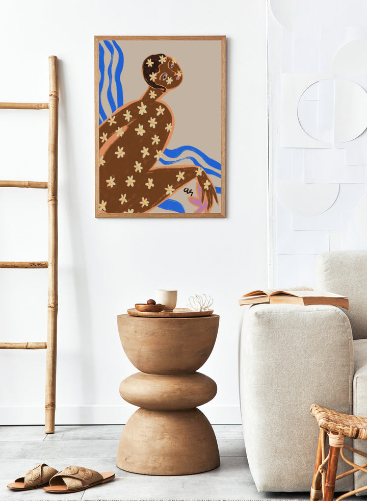 Artistic illustration of a person with floral patterns on a beige background. Blooming Daisy by Arty Guava is a modern woman floral art print with daisies and bold blue lines. Officially licensed contemporary wall poster.