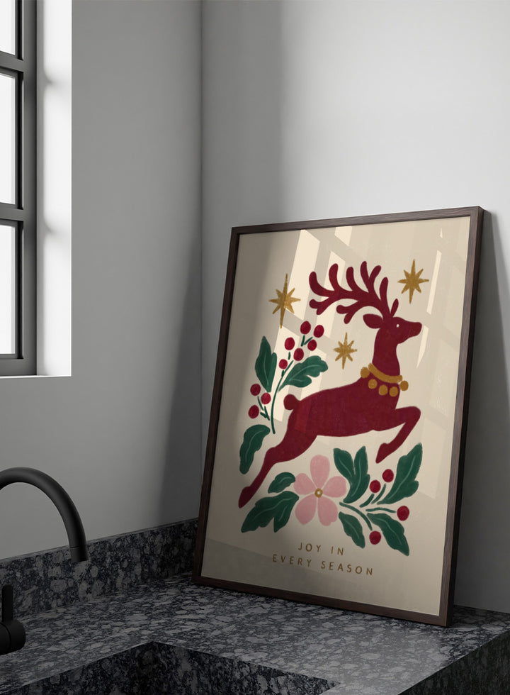 Shop Jumping Reindeer Joy by Katarzyna Gąsiorowska, a Christmas wall art print poster featuring a leaping reindeer, berries, greenery, stars, and festive holiday charm.