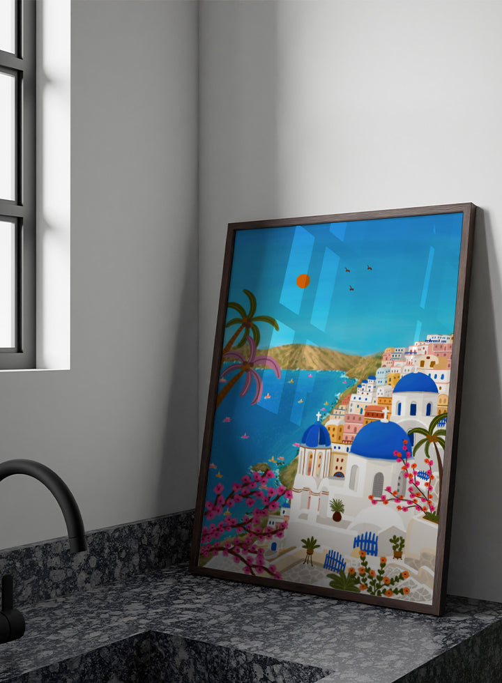 Shop Santorini Blue Domes by Nidhi Kachhadiya, a colorful Greek island wall art print inspired by Santorini, blue domes, whitewashed architecture, and Mediterranean views. A colorful illustrated coastal village scene with white buildings, bright blue domes, palm trees, pink flowering branches, a blue sea, and a clear sky with a sun and birds. 