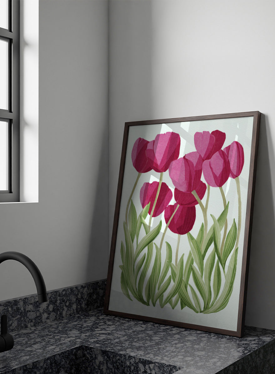 A stylized floral illustration of pink tulips with green leaves on a white background. Shop Tulips Floral Art Print by Katie O&