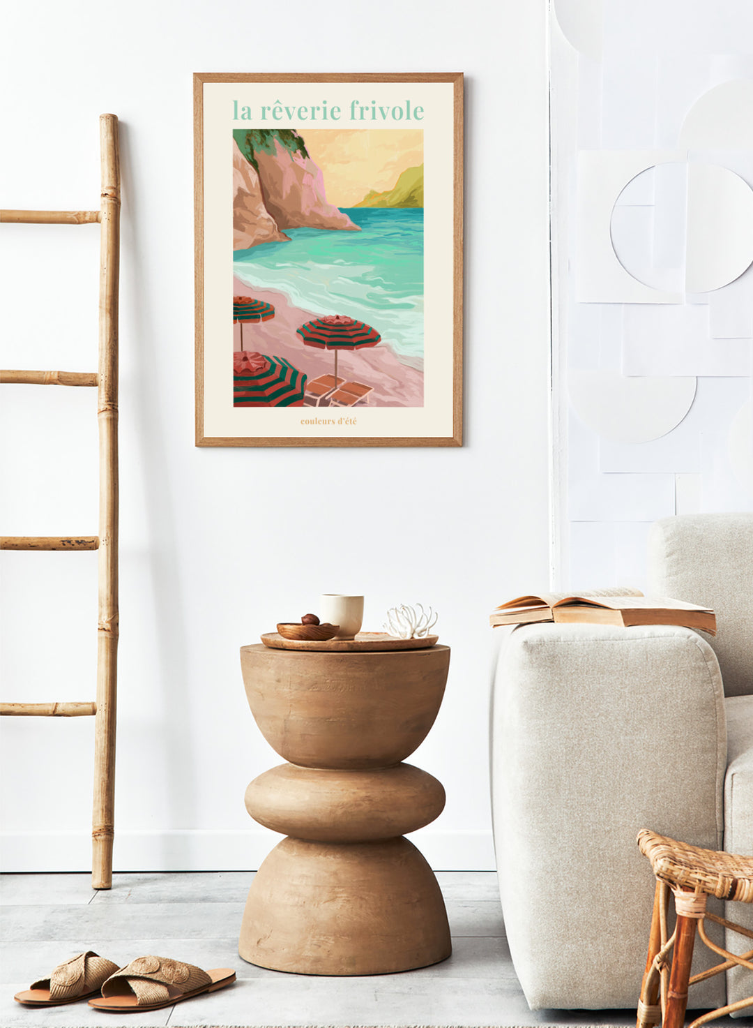 Beach scene with striped umbrellas and cliffs, featuring the text 'la reverie frivole'. La Rêverie Frivole Beach by Goed Blauw is a coastal art print and wall poster featuring striped umbrellas, turquoise water, and a warm seaside landscape.