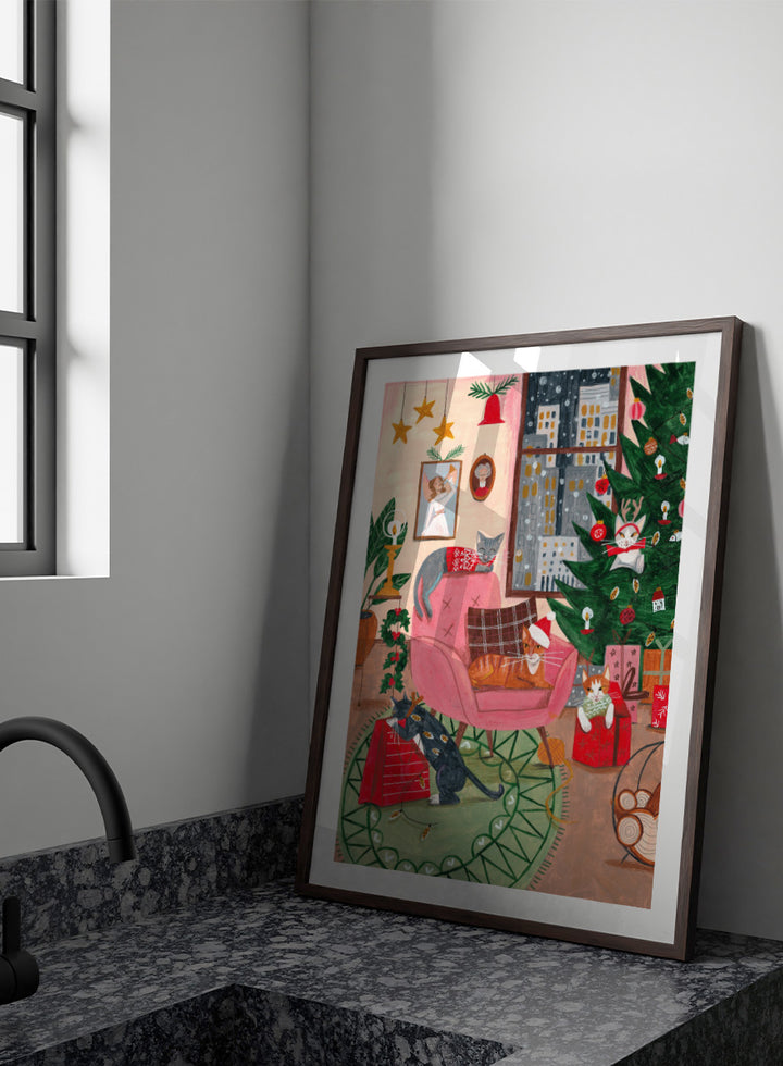 Shop Cats Home for Christmas by Caroline Bonne Müller, a festive cat wall art print poster featuring cats, a Christmas tree, presents, and a colorful holiday interior.