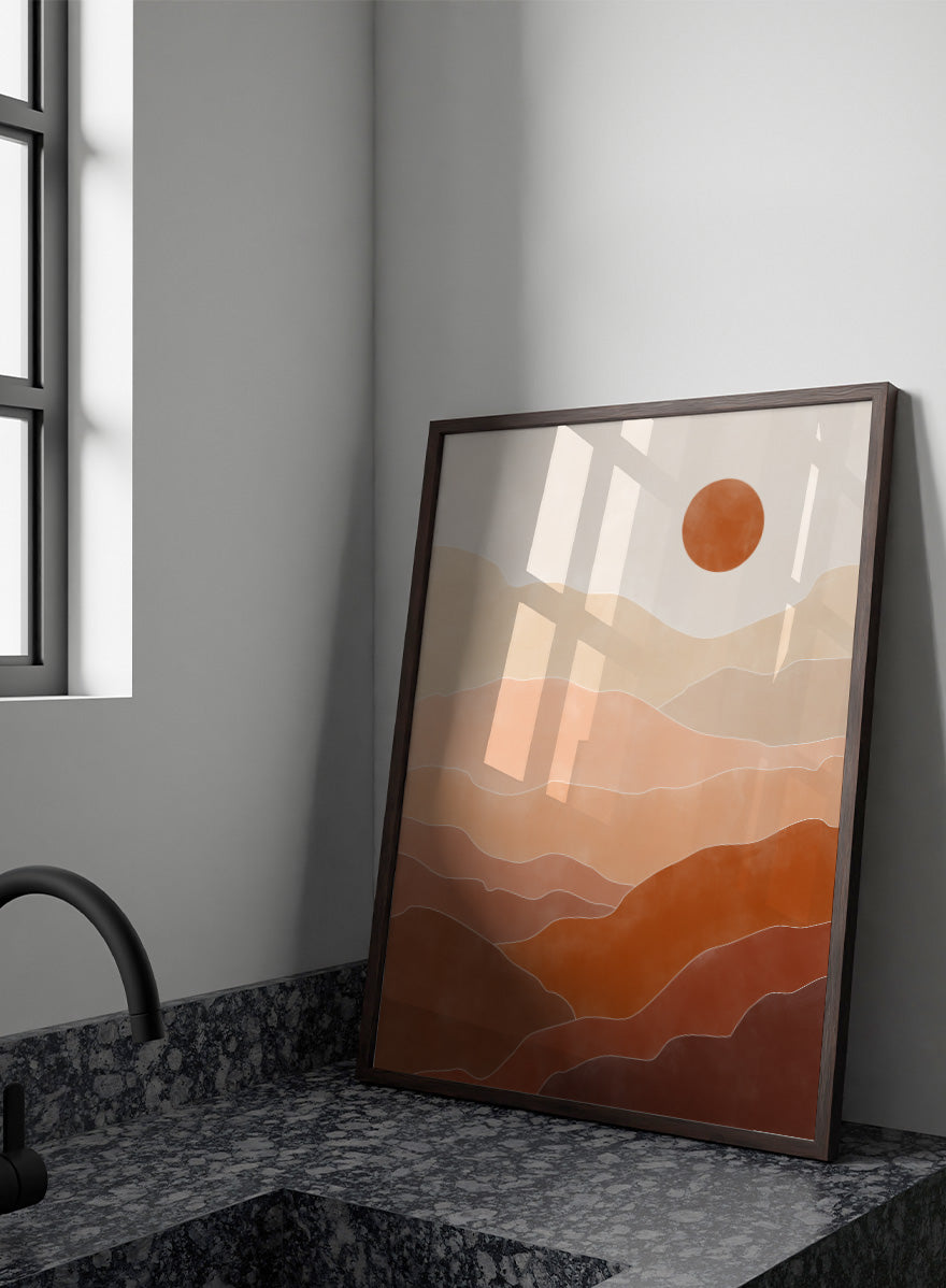 Shop Warm Desert Layers by Elena Ristova, a modern desert wall art print poster featuring layered hills, a terracotta sun, and warm peach, rust, and brown tones.
