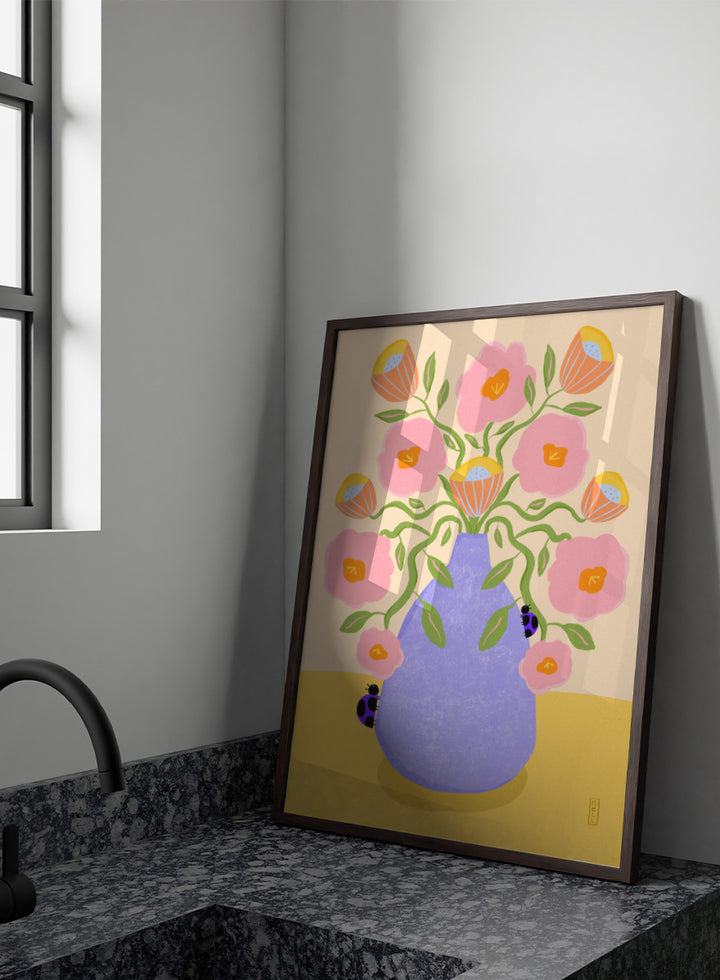 A stylized floral art print showing pink flowers with orange centers and green stems arranged in a light purple vase on a pale yellow surface. Shop Pink Flowers Ladybugs by Dirkie Nell, a colorful floral art print featuring pink flowers, a lavender vase, green stems, and playful ladybugs.