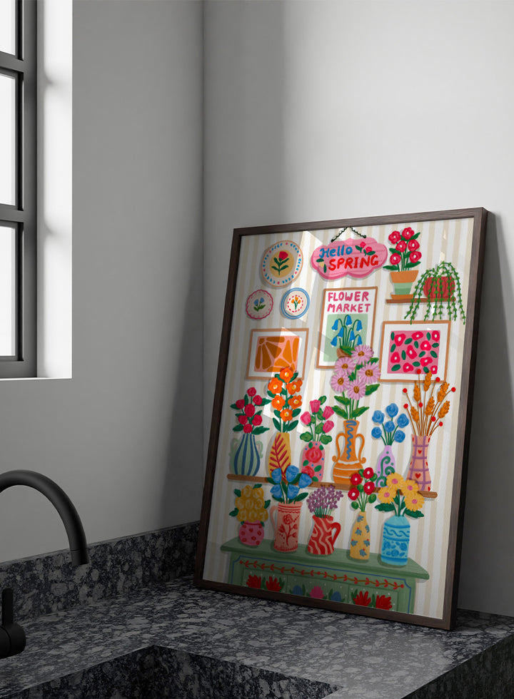 A colorful spring-themed floral wall display illustration featuring vases, framed art, hanging plants, and a sign reading &