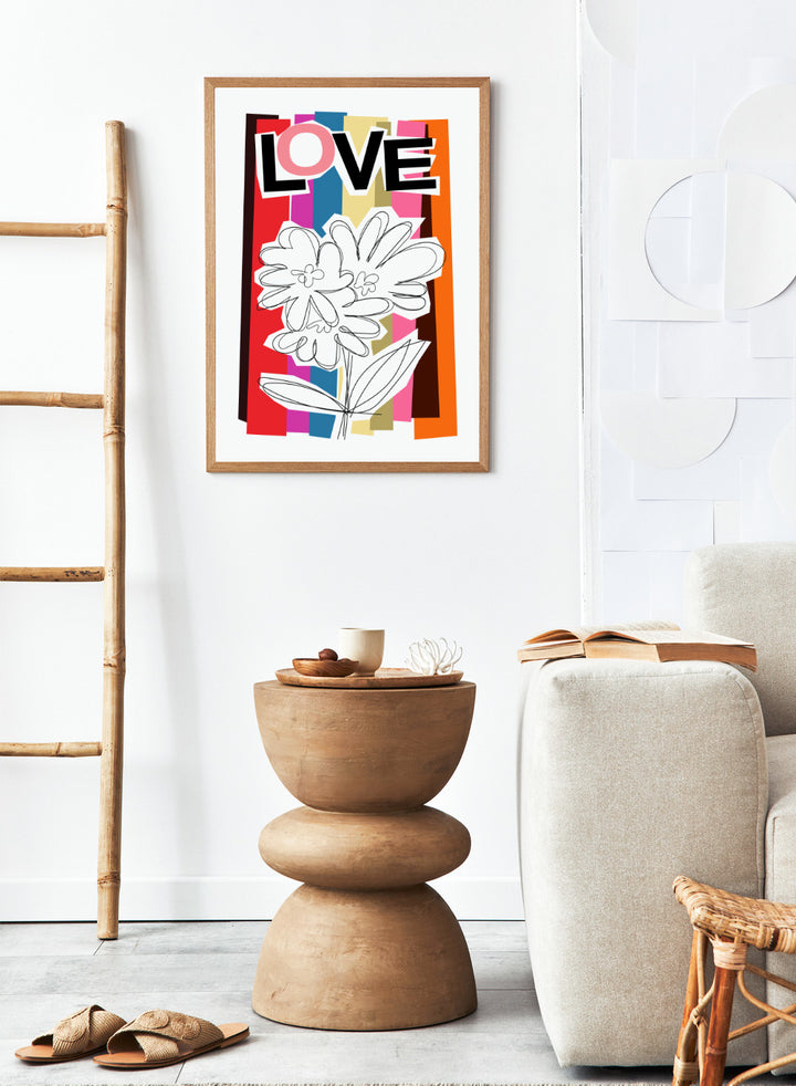 Colorful abstract design with flowers and the word 'LOVE' on a striped background. Scribble Flower by Frances Collett art print featuring a hand-drawn flower over bold colorful stripes with the word LOVE. Officially licensed wall poster with framing option.