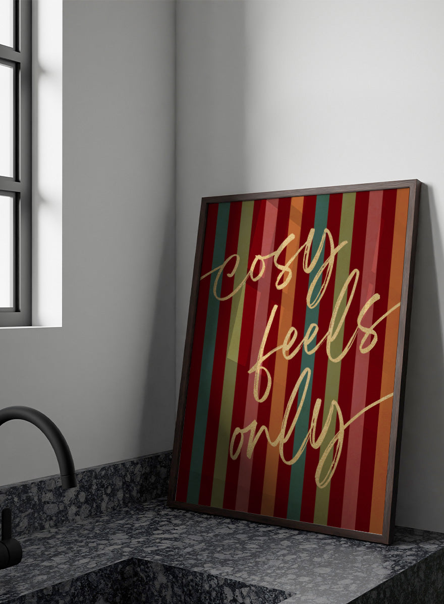 Shop Cosy Feels Christmas by Dominique Vari, a colorful holiday wall art print poster featuring retro stripes, gold lettering, and festive red and green tones.